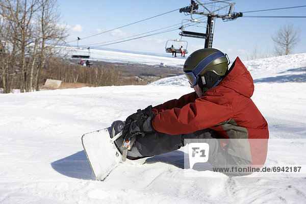 Boy on Ski Hill with Snowboard  Blue Mountain  Collingwood  Ontario  Canada