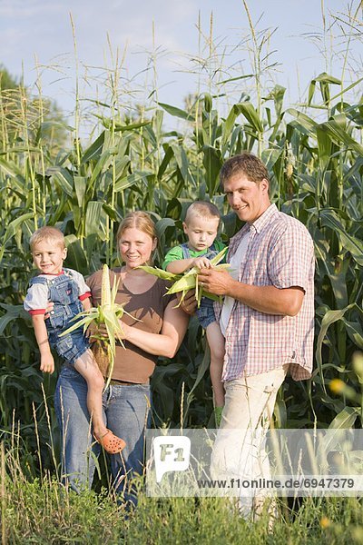 Family in Corn Field