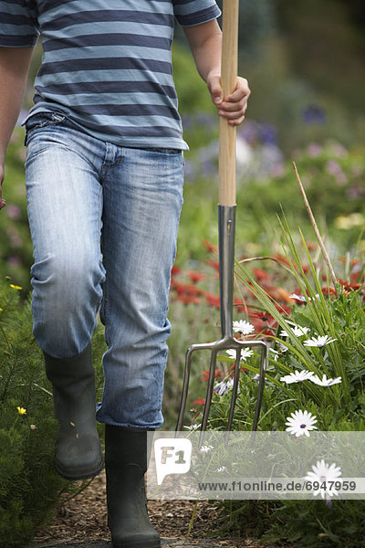 Jugendlicher  tragen  Junge - Person  Gartenbau  Gabel
