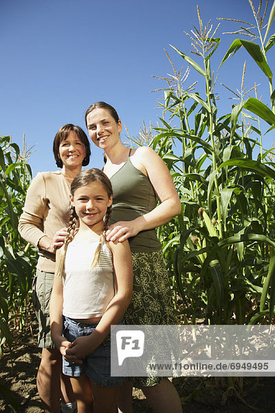 Portrait of Daughter  Mother and Grandmother in Cornfield