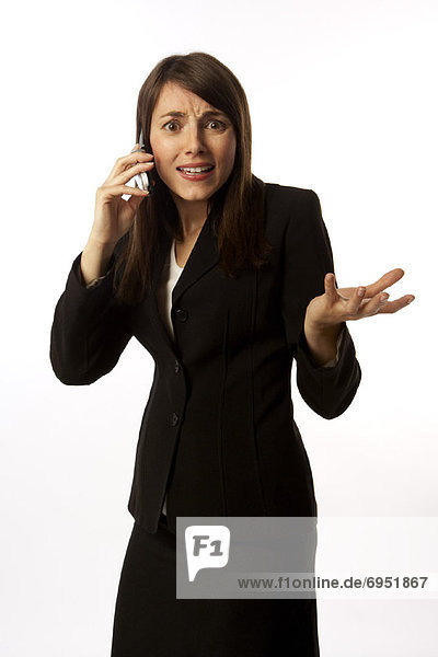 Stressed Businesswoman on Cell Phone