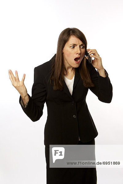 Angry Businesswoman on Cell Phone