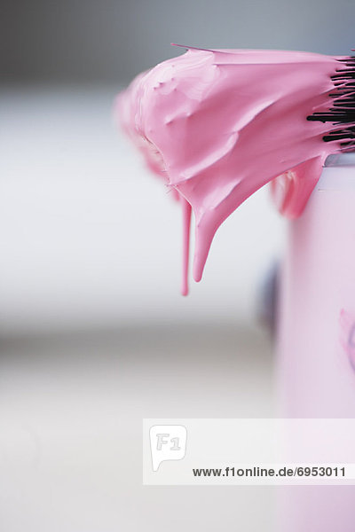 Close-Up of Paint Brush Dripping Pink Paint