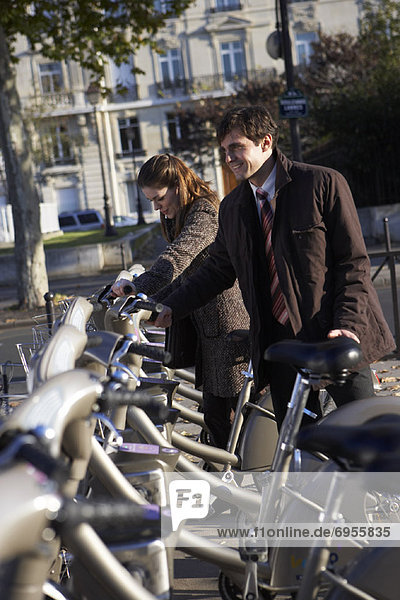 People Renting Bicycles  Paris  France