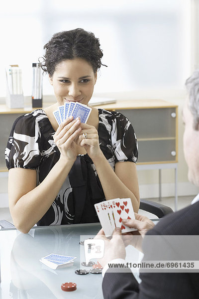 Business People Playing Cards
