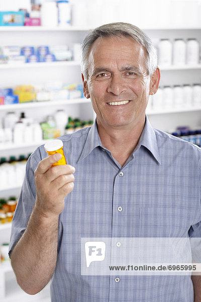 Portrait  Mann  halten  Pille  Pharmazie  Flasche  Apotheke