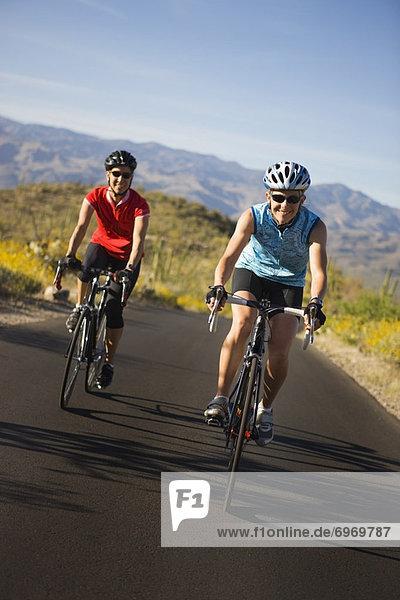 Two Women Cycling  Saguaro National Park  Arizona  USA