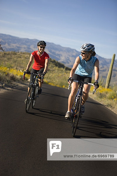 Two Women Cycling  Saguaro National Park  Arizona  USA