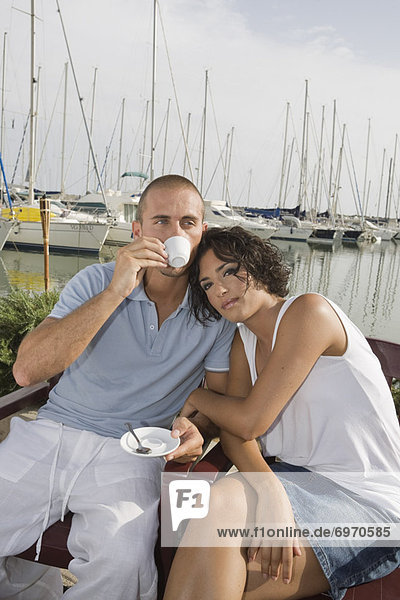 Couple Drinking Coffee at Harbor  Rome  Italy