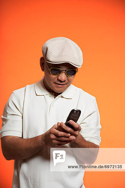 Man Using Cellular Phone