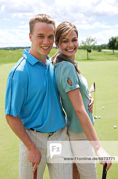 Portrait of Couple on Golf Course