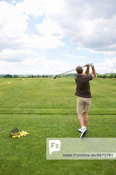 Man at Driving Range Burlington Ontario Canada