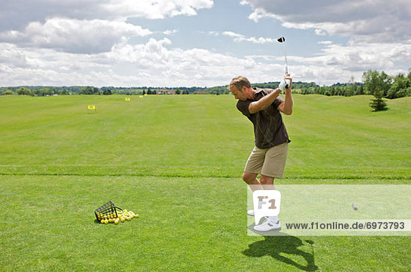 Man at Driving Range Burlington Ontario Canada