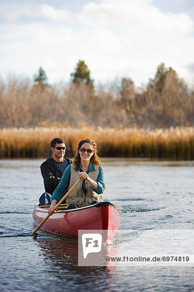 Couple Canoeing on the Deschutes River  Bend  Oregon  USA