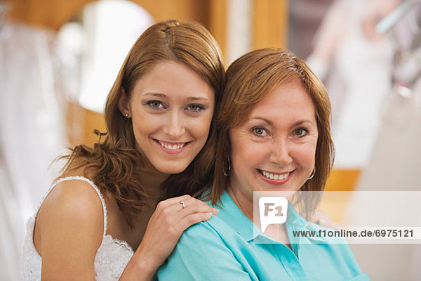 Portrait of Mother and Daughter in Bridal Shop