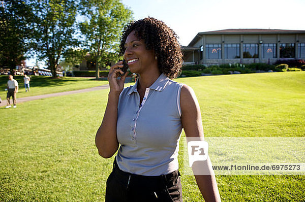 Golfer with Cellular Phone  Burlington  Ontario  Canada