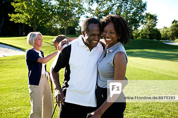 Couples on Golf Course  Burlington  Ontario  Canada