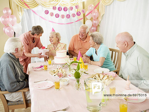 Seniors in a Retirement Home Celebrating a Birthday