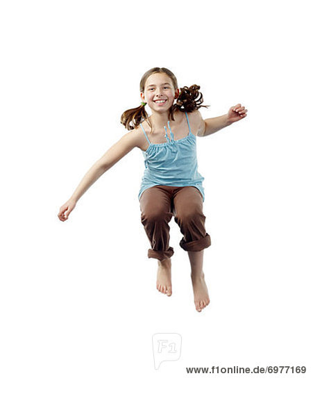 Portrait of Young Girl Jumping