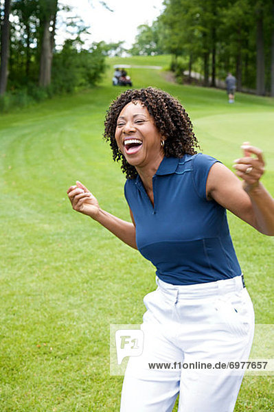 Frau  lachen  Golfsport  Golf  Kurs