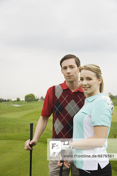Couple Golfing