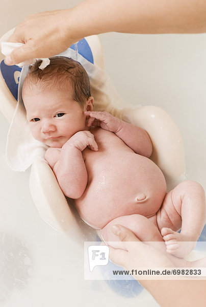 3 Week Old Baby Girl Getting a Bath