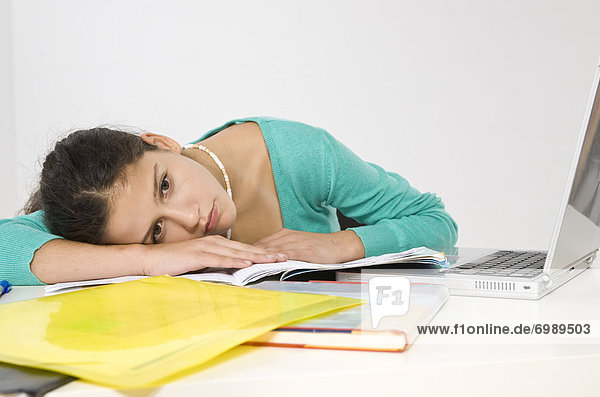 Girl Taking a Break from Homework