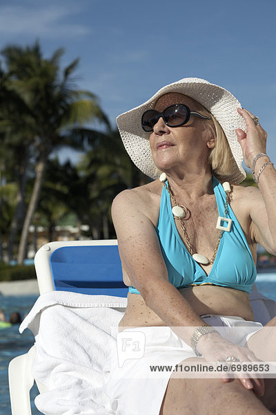Woman Sunbathing by Pool  Cayo Coco  Cuba