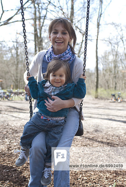 Mother and Son on Swing