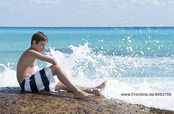Boy Sitting by Surf  Playa del Carmen  Yucatan Peninsula  Mexico