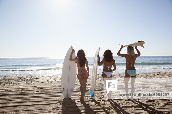 Women with Surf Boards  Zuma Beach  California  USA