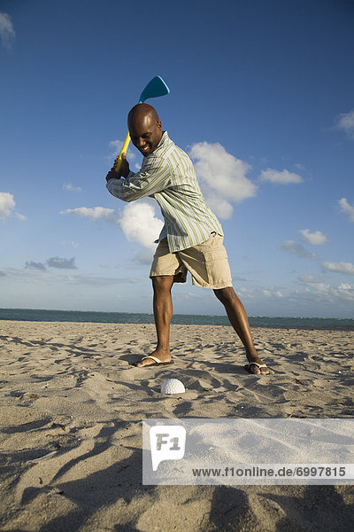Man Playing Golf on the Beach  Florida  USA