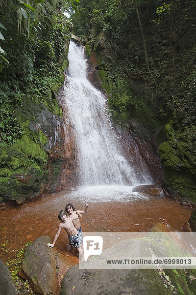 Boys Playing in Waterfall  Miravalles  Cordillera de Guanacaste  Guanacaste  Costa Rica