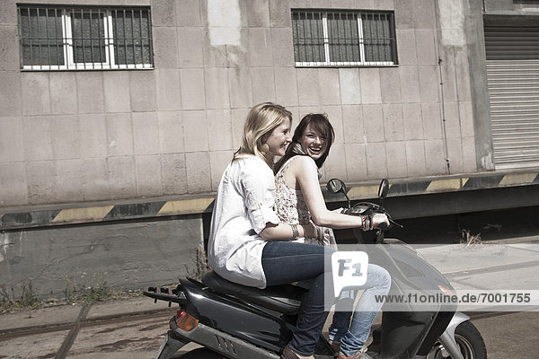 Young Women on Scooter