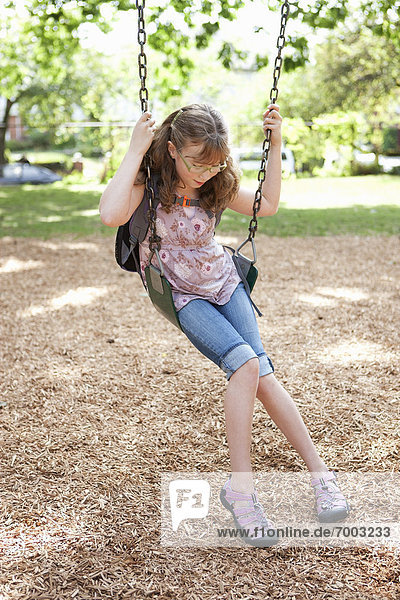 Girl Playing on Swings  Washington Park Playground  Portland  Oregon  USA