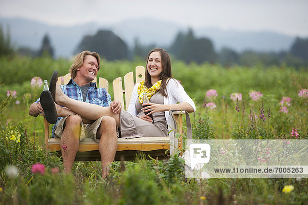 Couple on Bench in Field  Portland  Oregon  USA