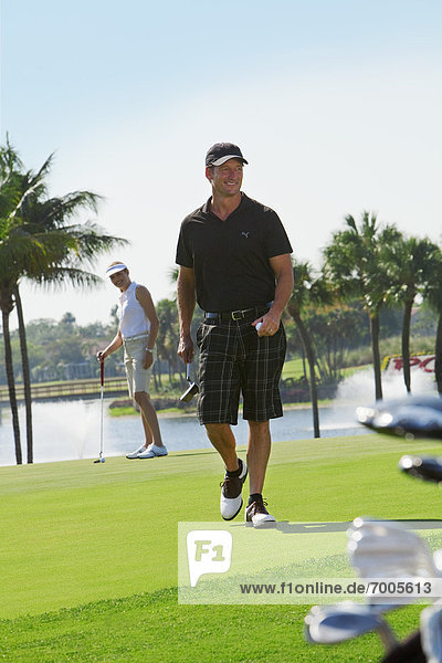 Golfers on Putting Green  PGA National Resort and Spa  Palm Beach Gardens  Florida  USA