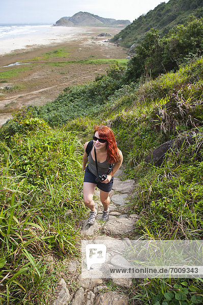 Woman Hiking up Coastal Hills  Ilha do Mel  Parana  Brazil