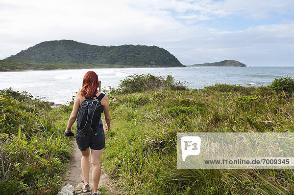 Backview of Woman Hiking  Ilha do Mel  Parana  Brazil