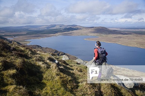 Hiker Looking Across Lough Easky In The Heart Of The Ox Mountains  County Sligo  Ireland