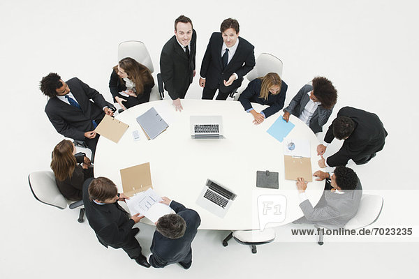 Businessman working with associates at working meeting