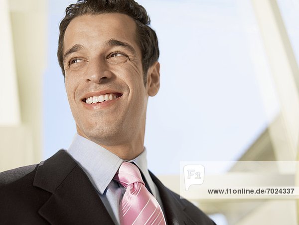 Businessman smiling (portrait)