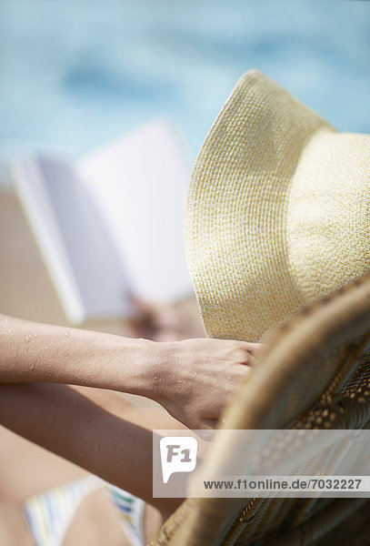 Mid-Adult Woman Wearing Sunhat