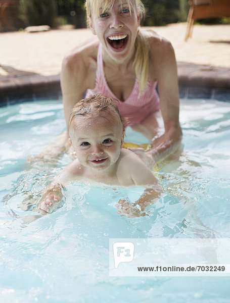 Mother and Baby Boy in Swimming Pool