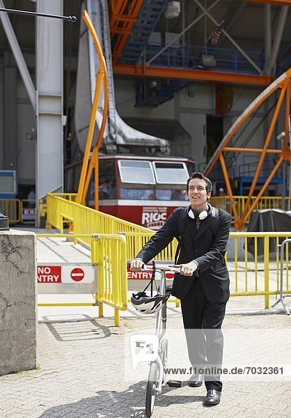 Businessman with Bicycle at Roosevelt Island Tramway