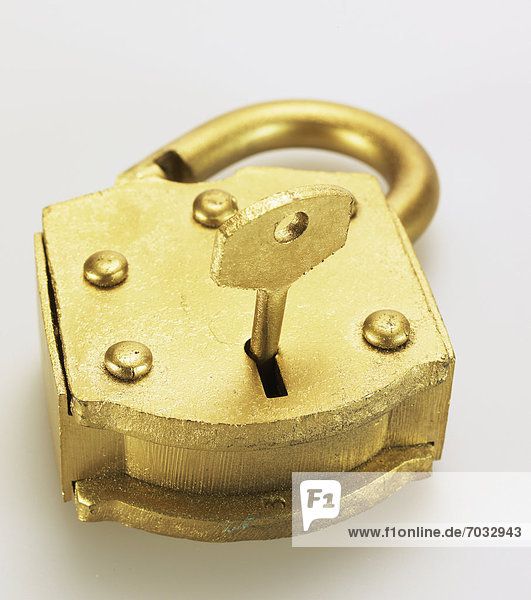 Key in Golden Padlock