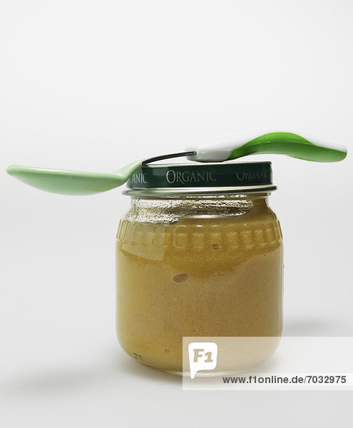 Spoon on Jar of Baby Food