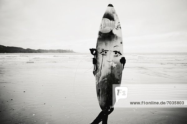 Person Holding Surfboard