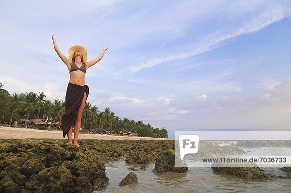 Woman With Arms Raised At The Beach  Ko Lanta  Thailand