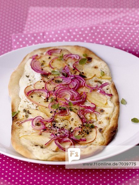 Tarte flambÈe with apples and red onions